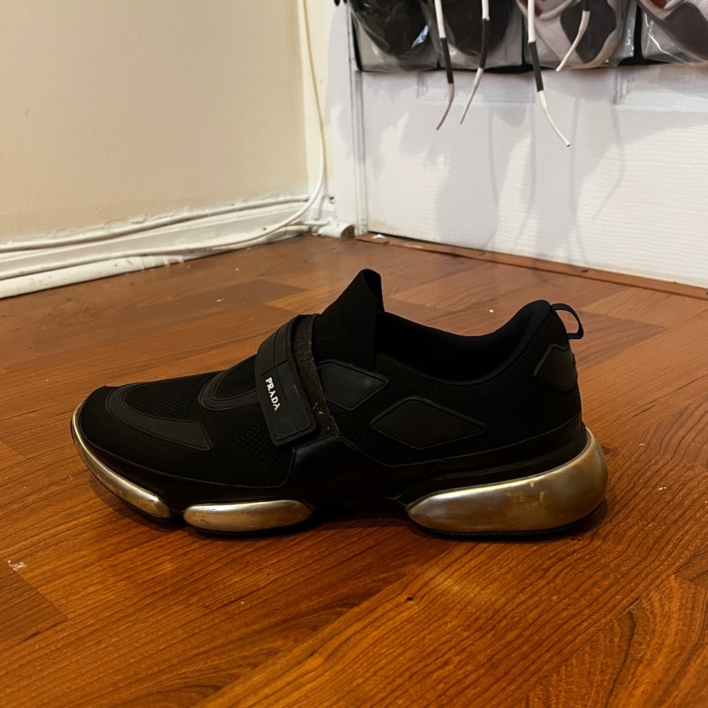 Prada Black Sneakers with Gold Accents